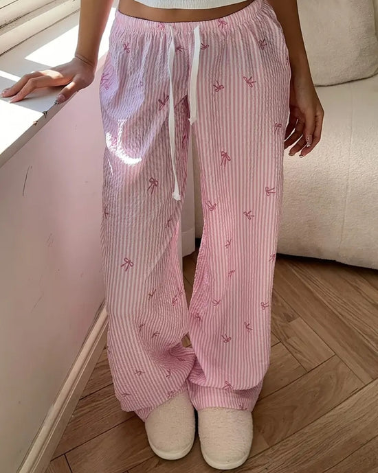 Vaaleanpunaiset raitayö olohousut