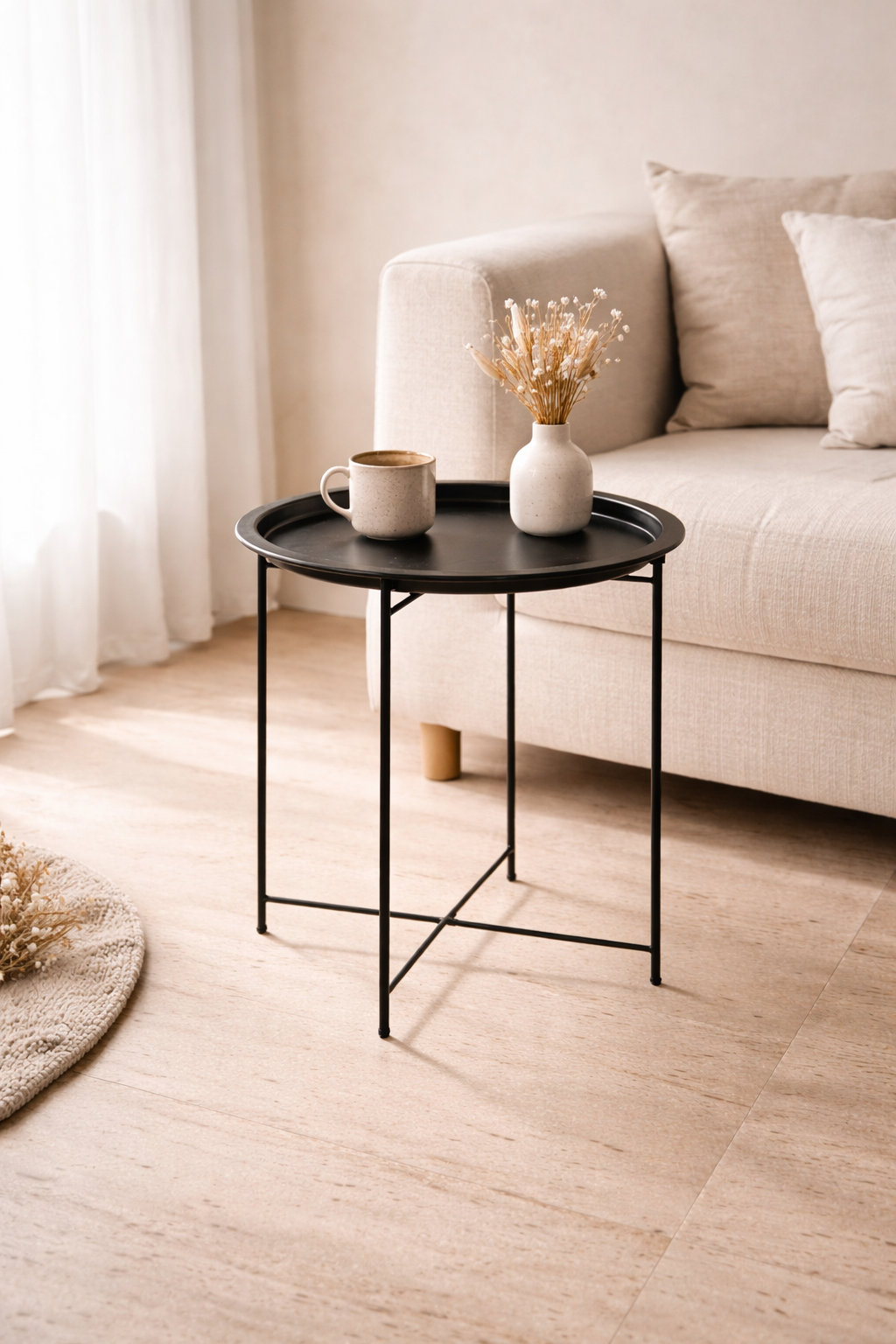 Minimalistinen pyöreä sivupöytä – musta